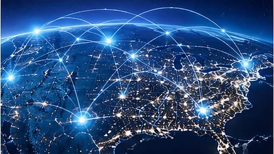 Night view of North America with illuminated network nodes linked by arcing connections